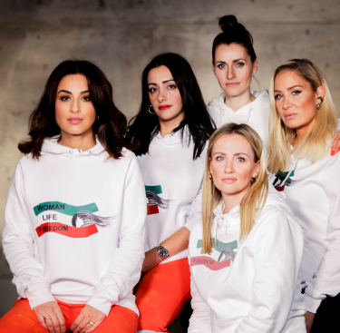prominent women wear the charity hoodie