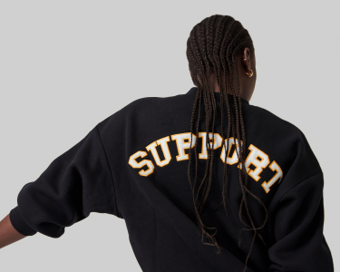 Young Woman wearing a sweater with the word "SUPPORT"